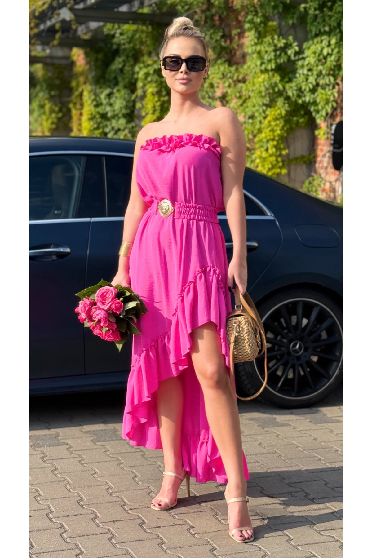 Abito estivo corto e lungo fucsia Moda-Mania con scollo a barchetta, maniche rimovibili e cintura, ideale per look estivi eleganti.