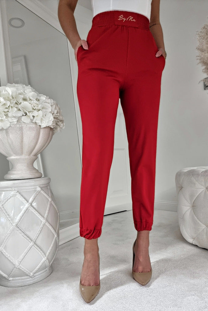 Pantaloni casual sportivi rossi con vita e caviglie elasticizzate e tasche laterali