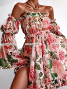 Abito estivo Moda-Mania a fantasia floreale verde e rossa, maniche lunghe larghe e apertura sul dietro, abito corto elegante.