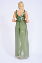 Abito corto verde oliva in paillettes con aperture laterali e strascico removibile, firmato Moda-Mania, elegante e scintillante.