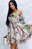 Abito estivo bianco avorio Moda-Mania con fantasia floreale e foglie, apertura sul dietro e maniche lunghe rimovibili.