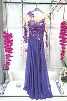 Abito lungo lilla Moda-Mania con strascico, corpetto in tulle nude a fiori 3D, elegante e femminile.