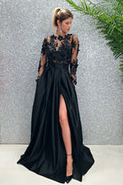 Abito lungo svasato nero Moda-Mania con corpetto in tulle floreale 3D e gonna in taffetà, maniche lunghe e stile elegante.