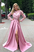 Abito lungo rosa svasato Moda-Mania con corpetto a manica lunga in tulle floreale 3D e gonna in taffetà, elegante e femminile.