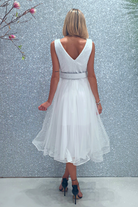 Abito princess bianco in tulle con corpetto a pois glitterati e cintura regolabile, abiti corti moda-mania.