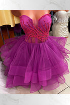 Abito princess magenta Moda-Mania con corpetto a cuore regolabile e gonna in tulle a strati, vestito corto elegante e colorato.