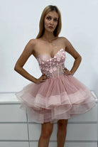 Abito princess rosa Moda-Mania, con corpetto a cuore regolabile e gonna in tulle a strati, perfetto per occasioni speciali.
