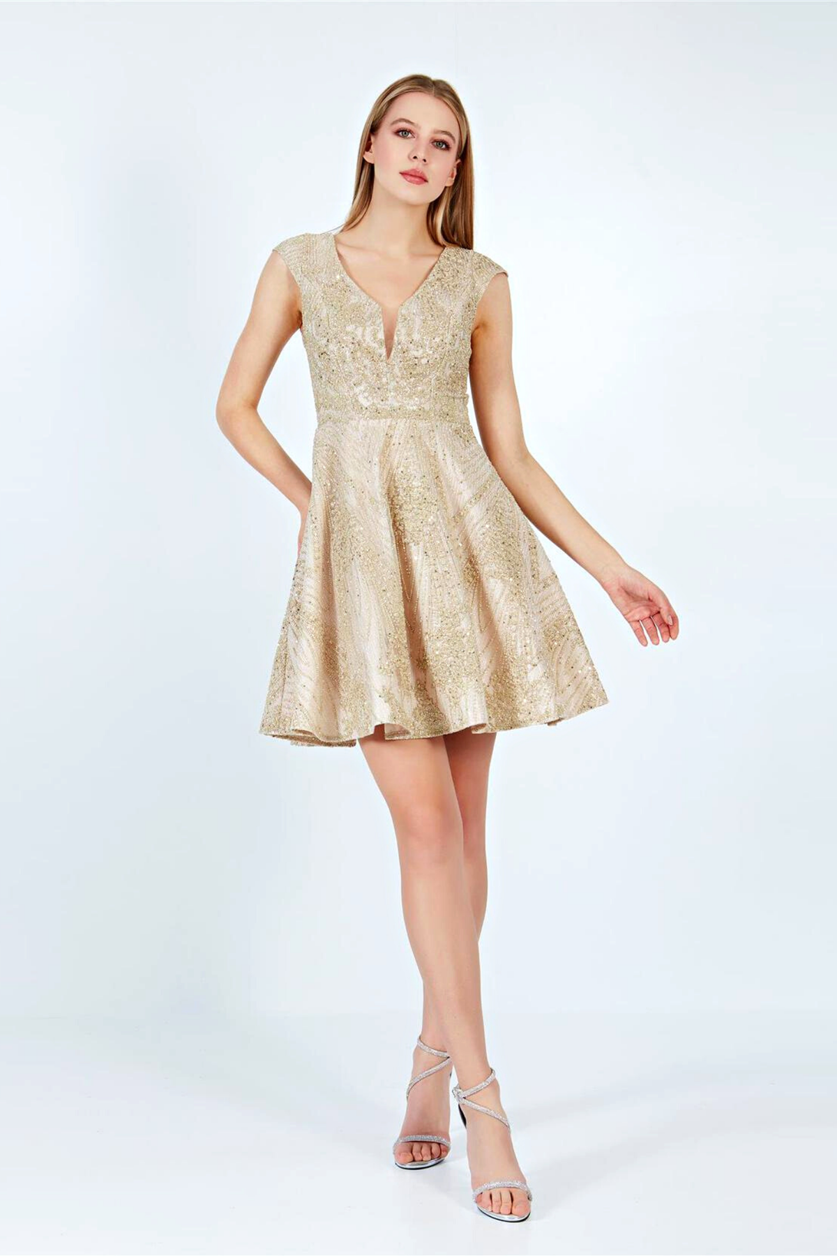 Abito svasato con scollo a V in tessuto beige chiaro con stampa glitterata dorata, abiti corti Moda-Mania.