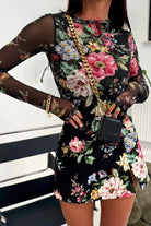Blusa aderente nera con fantasia floreale, maniche lunghe in tessuto rete elasticizzato, moda-mania.