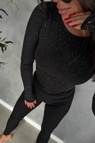 Blusa aderente nera Moda-Mania con maniche lunghe, tessuto glitterato stretch elasticizzato, elegante e alla moda.