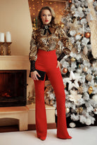 Camicia a stampa leopardata Fofy con collo alto, maniche lunghe e polsini in pizzo, tessuto elegante e di tendenza.