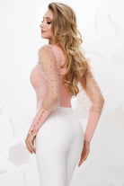 Camicia rosa pesca Fofy elegante con maniche a sbuffo in tulle con perline e polsini alti, dettagli raffinati.