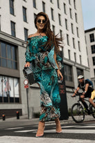 Completo estivo Moda-Mania verde petrolio a fantasia maculata con top e pantaloni larghi in georgette, stile elegante e leggero.