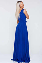 Abito lungo svasato blu Fofy con corpino decorato con piccole perline e fiocco, ideale per occasioni eleganti.