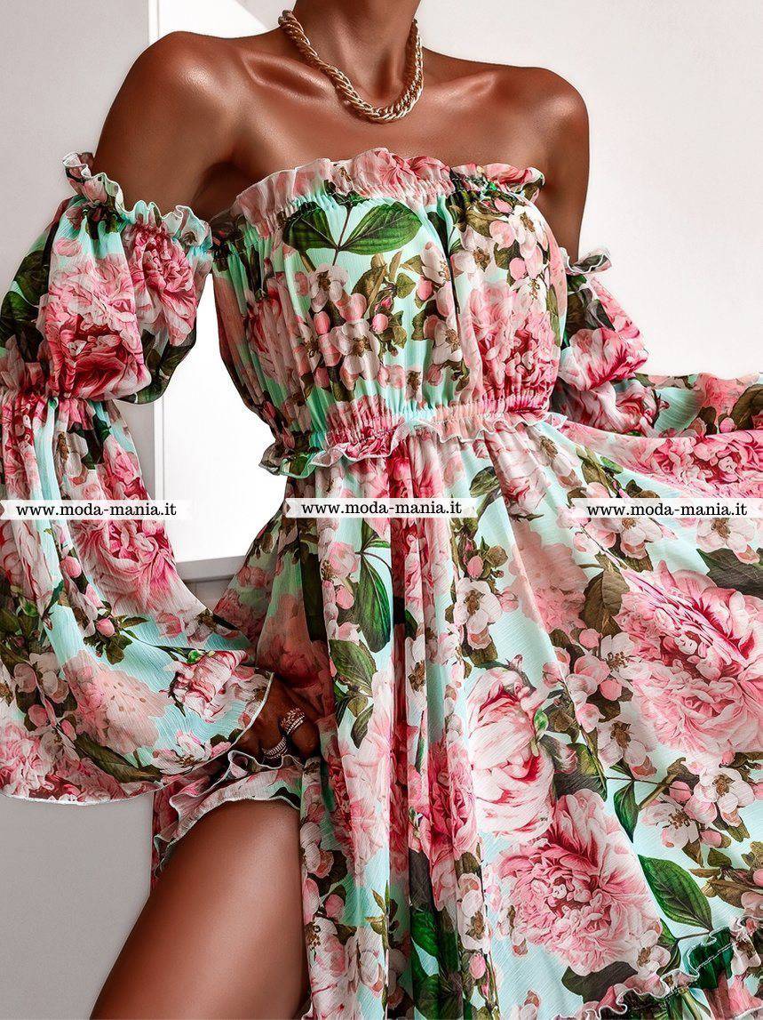 Abito estivo corto di Moda-Mania con fantasia floreale verde e rosa, apertura posteriore e maniche lunghe larghe.