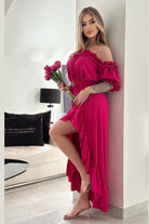 Abito estivo fucsia corto davanti e lungo dietro con scollo a barchetta, maniche rimovibili e cintura, marca Moda-Mania.
