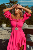Abito estivo fucsia corto davanti e lungo dietro con scollo a barchetta, maniche rimovibili e cintura, marca Moda-Mania.