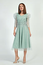 Abito midi verde menta da cerimonia in tulle lamè e chiffon decorato con brillantini, firmato Moda-Mania.