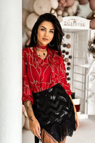 Blusa rossa Moda-Mania con stampa dorata a paillettes e nastro in tessuto rimovibile, maniche lunghe e stile elegante.