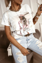 T-shirt bianco Moda Mania in cotone con stampa profilo ragazza fashion, maniche corte con risvolto, vista frontale.