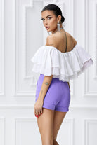 Pantaloncini corti viola Bby di Pretty Girl a vita alta con tasche laterali, tessuto morbido e comodo, stile casual e trendy.
