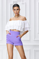 Pantaloncini corti viola di Pretty Girl, a vita alta con tasche laterali, ideali per un look estivo e casual.