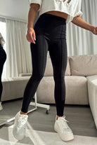 Leggings neri aderenti in cotone spesso elasticizzato, vita alta con cuciture longitudinali, pantaloni moda-manìa, stile comodo e elegante