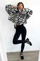 Leggings neri a vita alta Moda-Mania con cuciture longitudinali e tasche finte, ideali come pantaloni comodi e di moda