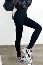 Pantaloni leggings neri a vita alta Moda-Mania con cuciture longitudinali e tasche finte, tessuto aderente e comodo