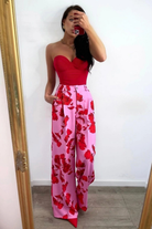Pantaloni lunghi a palazzo rosa con fantasia di rose rosse, tasche laterali e vita medio alta, marchio Moda-Mania