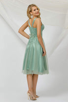 Abito corto svasato verde acqua in tulle a micro pois con fodera in raso e coppe a cuore, di marca Pretty Girl.