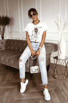 T-shirt bianco Moda Mania in cotone con stampa profilo ragazza, maniche corte con risvolto, stile fashion e casual.