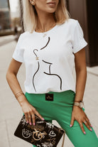 T-shirt bianco in cotone Moda Mania con stampa nera del profilo di una ragazza e maniche corte con risvolto.