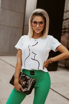 T-shirt bianco in cotone Moda Mania con stampa nera profilo ragazza, maniche corte con risvolto, style casual e moderno.