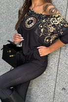 Salopette casual nera Moda-Mania con fantasia damasacata e tasche laterali, vestibilità comoda e stile elegante.