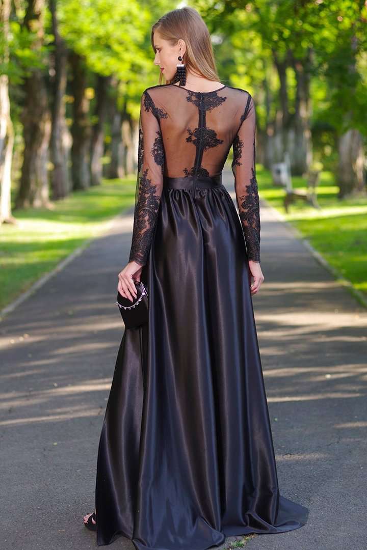 Abito lungo nero Artista con corpino in tulle ricamato e gonna con spacco in taffetà, design svasato elegante e distintivo.