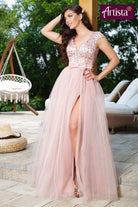 Abito lungo rosa Artista con corpetto aderente, schiena scoperta e gonna ampia in tulle con spacchi.