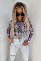 Blusa Moda-Mania a stampa pitonata beige e marrone con scollo e schiena a V reversibile, tessuto morbido e versatile