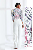 Top in paillettes fantasia zebrata multicolore con scollo a V e maniche a sbuffo, prodotto Moda-Mania, abbigliamento femminile.